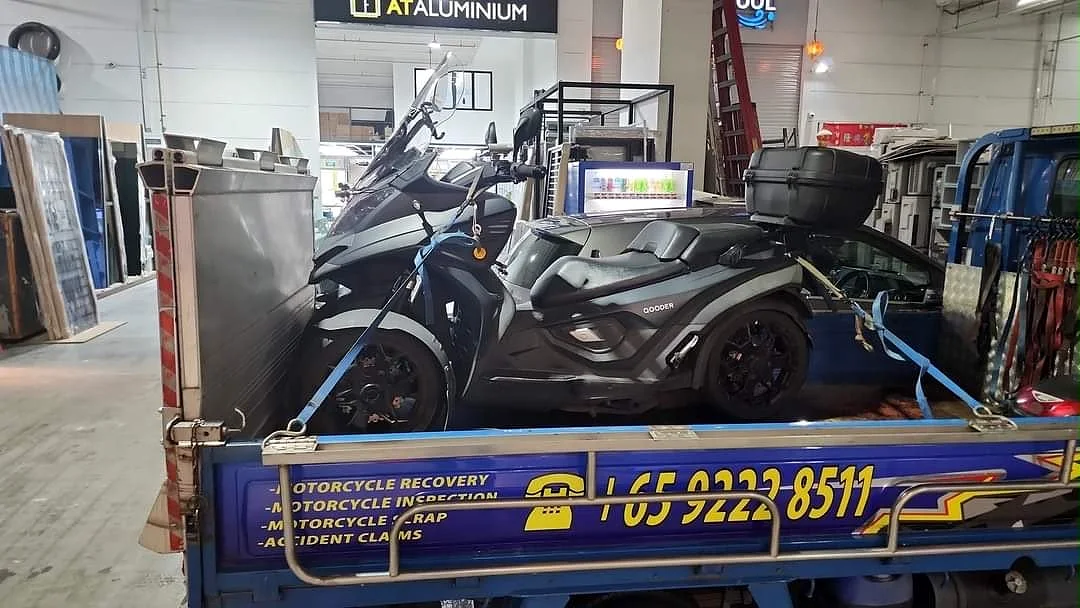Three-wheel motorcycle secured on a Siva Towing lorry for two-way inspection transport